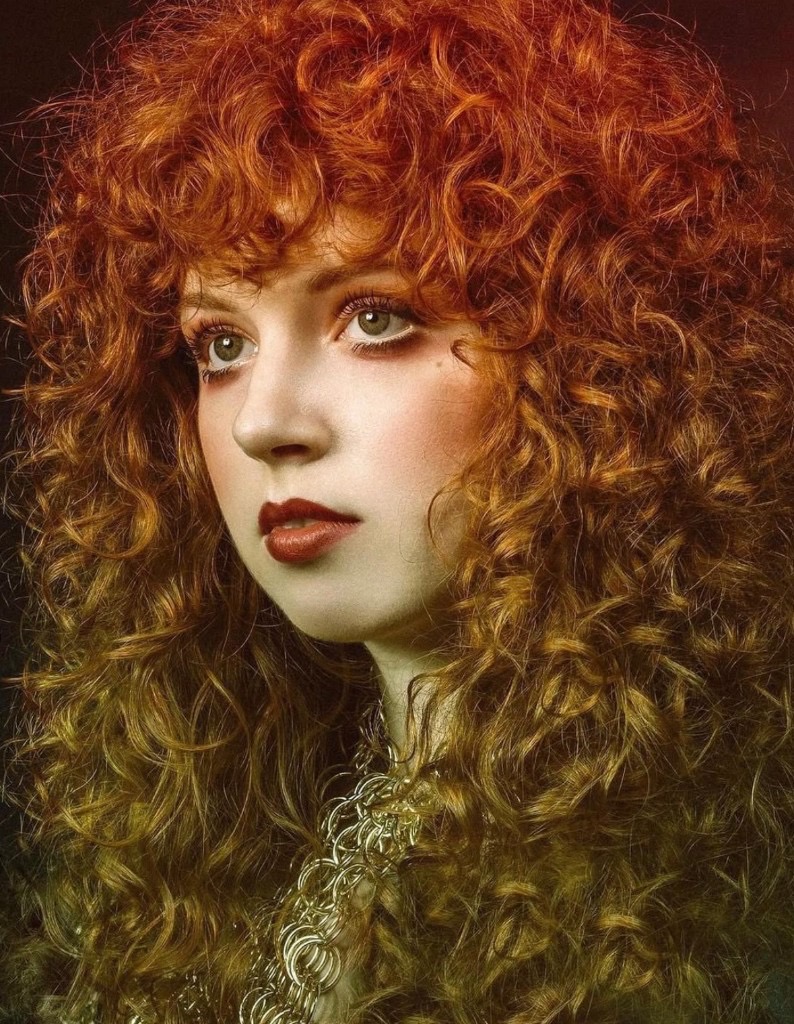 editorial portrait with red curly hair