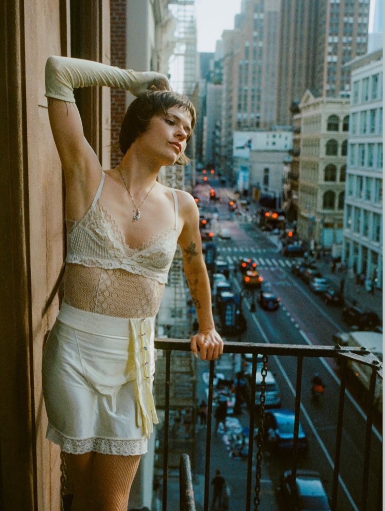 portrait on SoHo balcony with city background